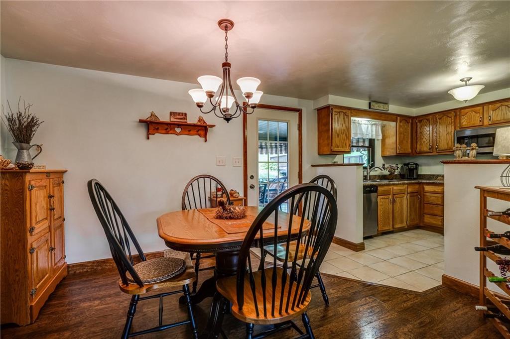 327 Sygan Road McDonald, PA 15057 - Photo 22 of 24 Glass door from the Dining Room open onto the covered deck.