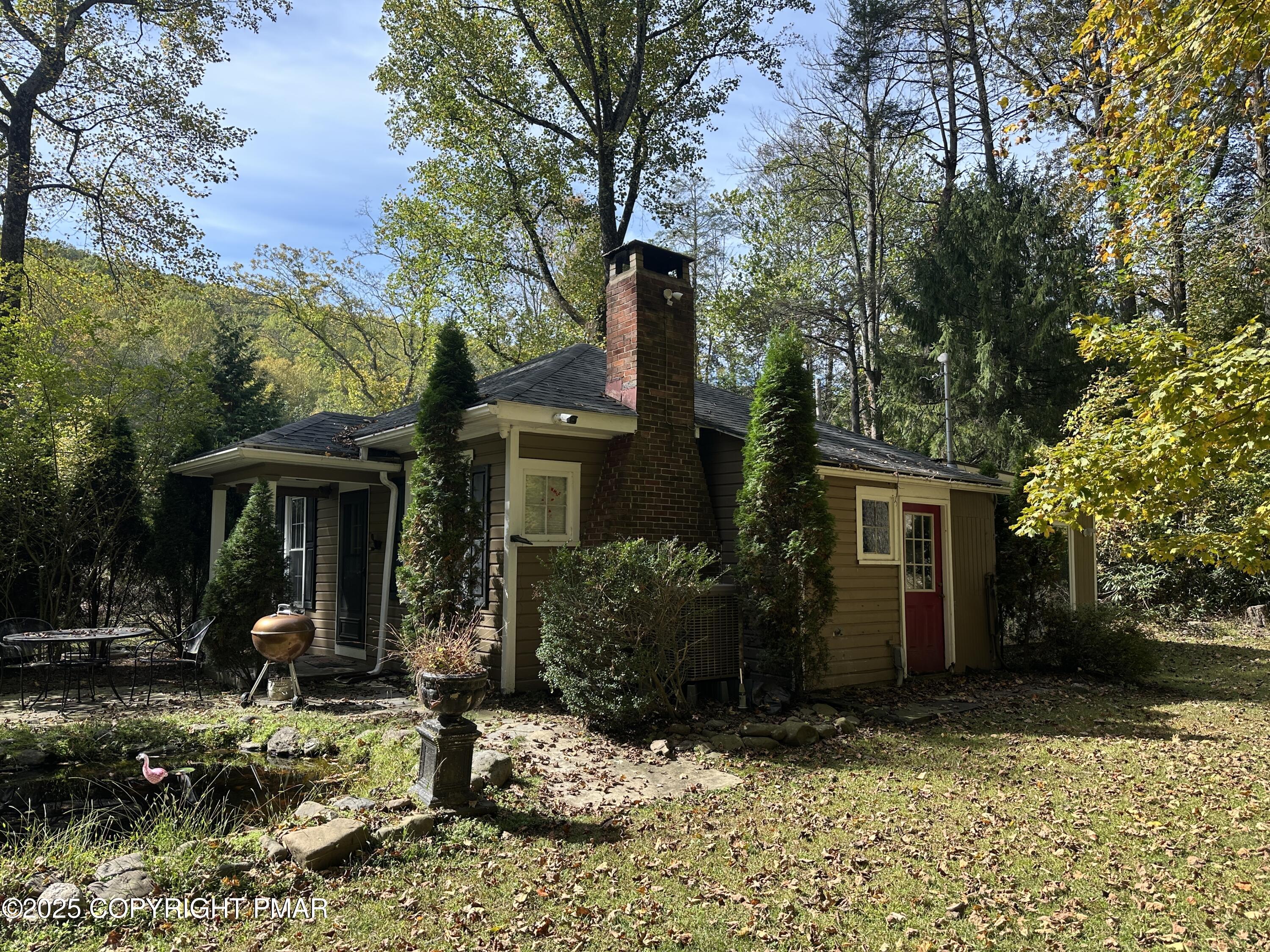 front view of a house with a yard