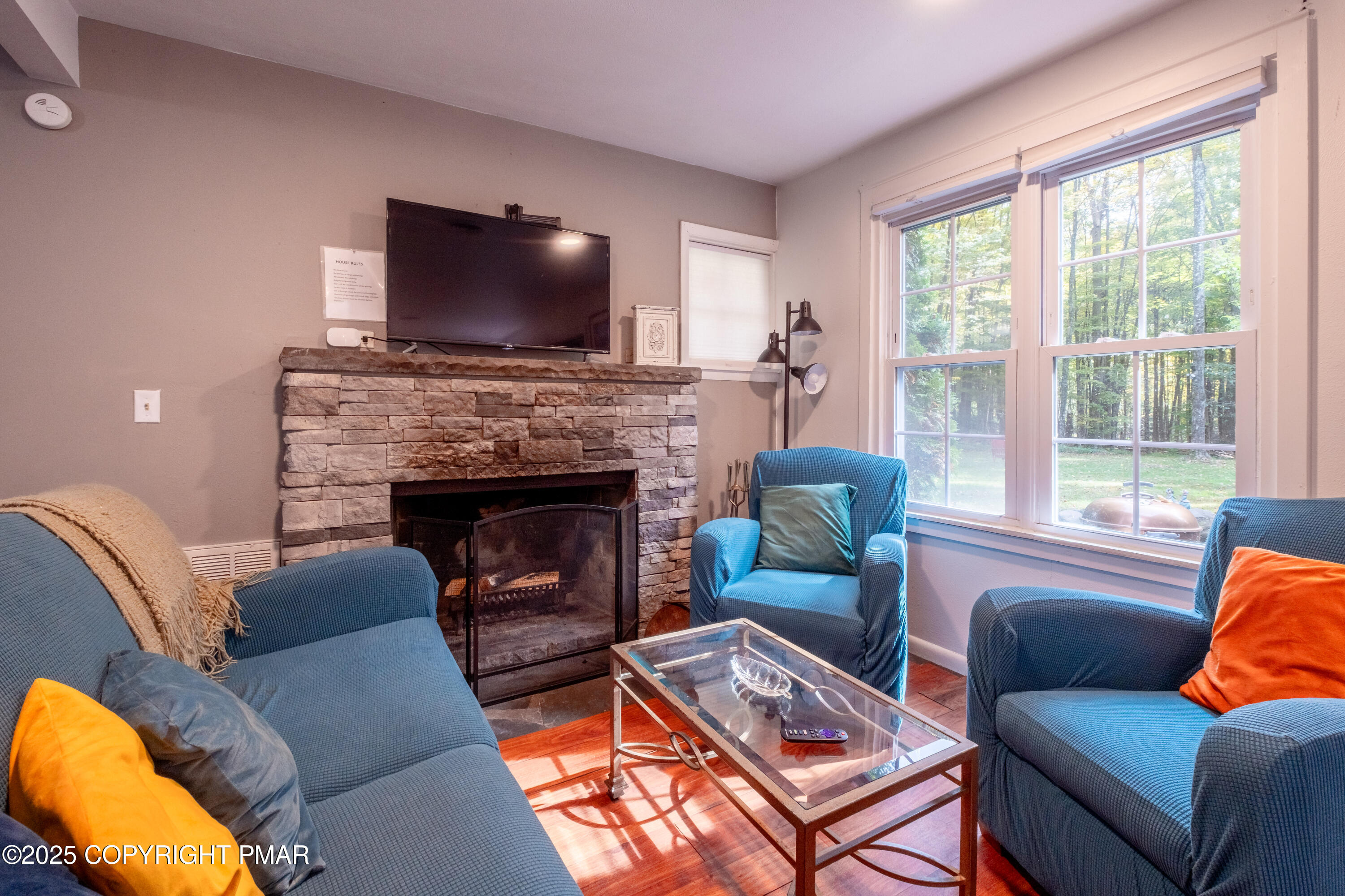1885 Sullivan Trail Tannersville, PA 18372 - Photo 14 of 46 a living room with furniture and a fireplace