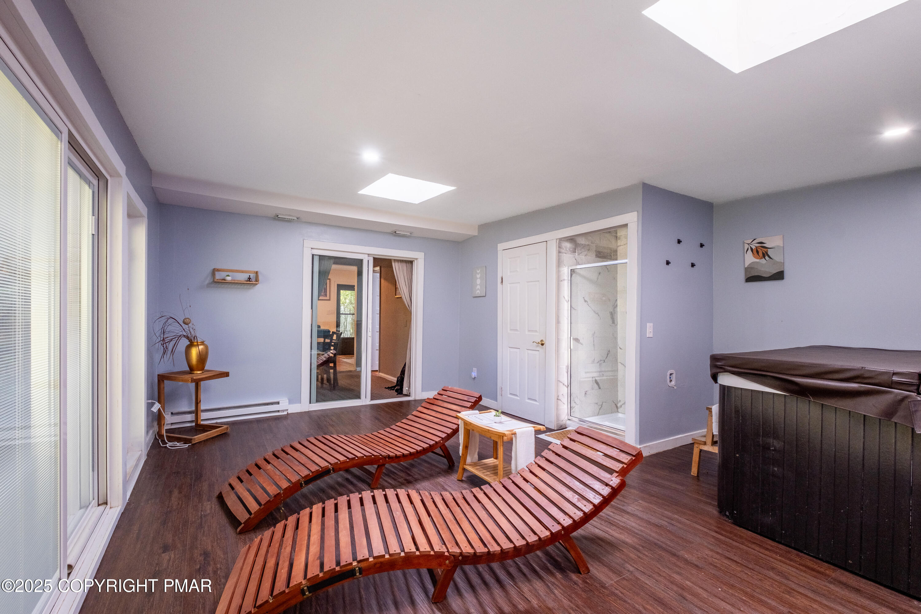 1885 Sullivan Trail Tannersville, PA 18372 - Photo 20 of 46 a bedroom with a bed and wooden floor