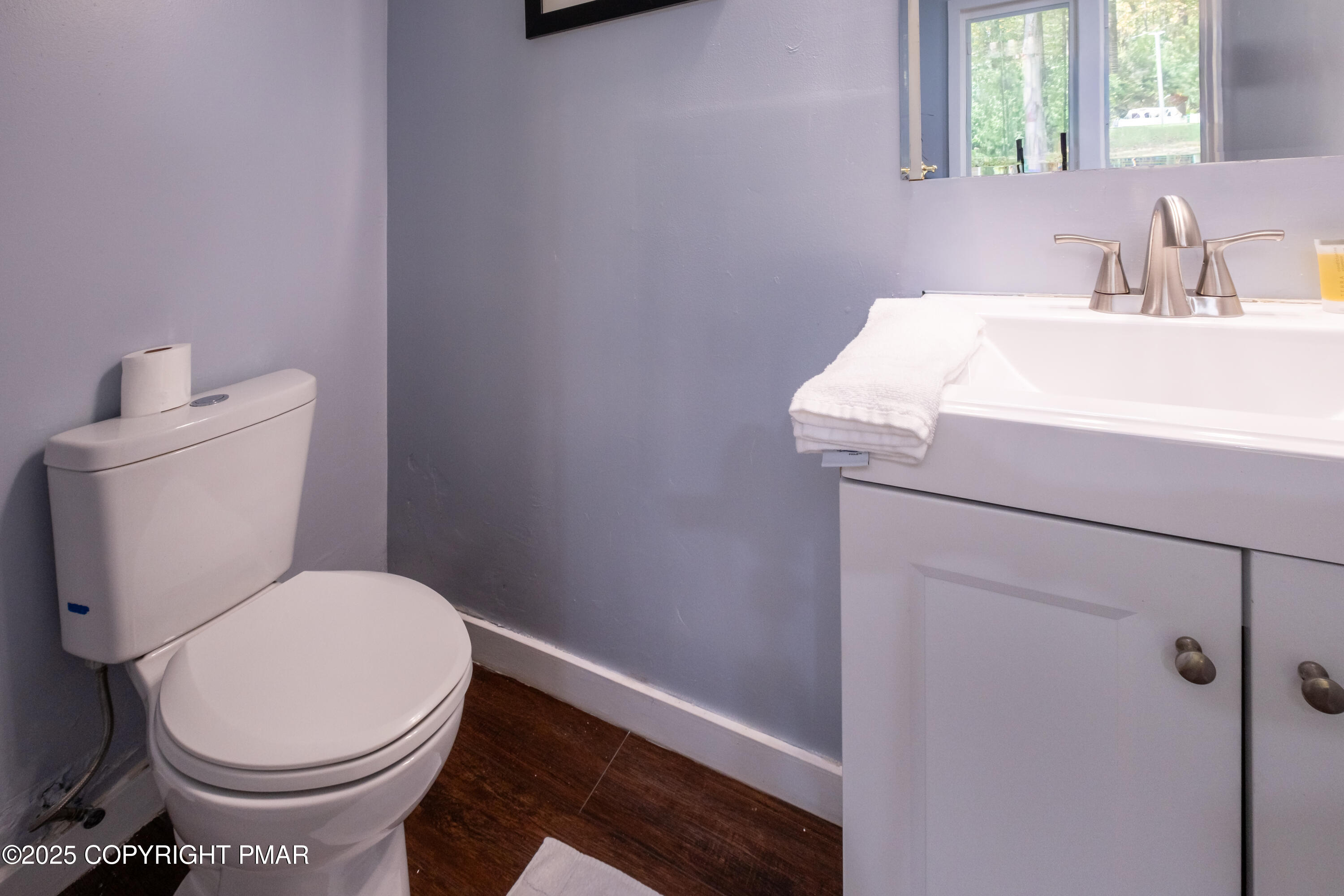 1885 Sullivan Trail Tannersville, PA 18372 - Photo 23 of 46 a white toilet sitting next to a bathroom sink