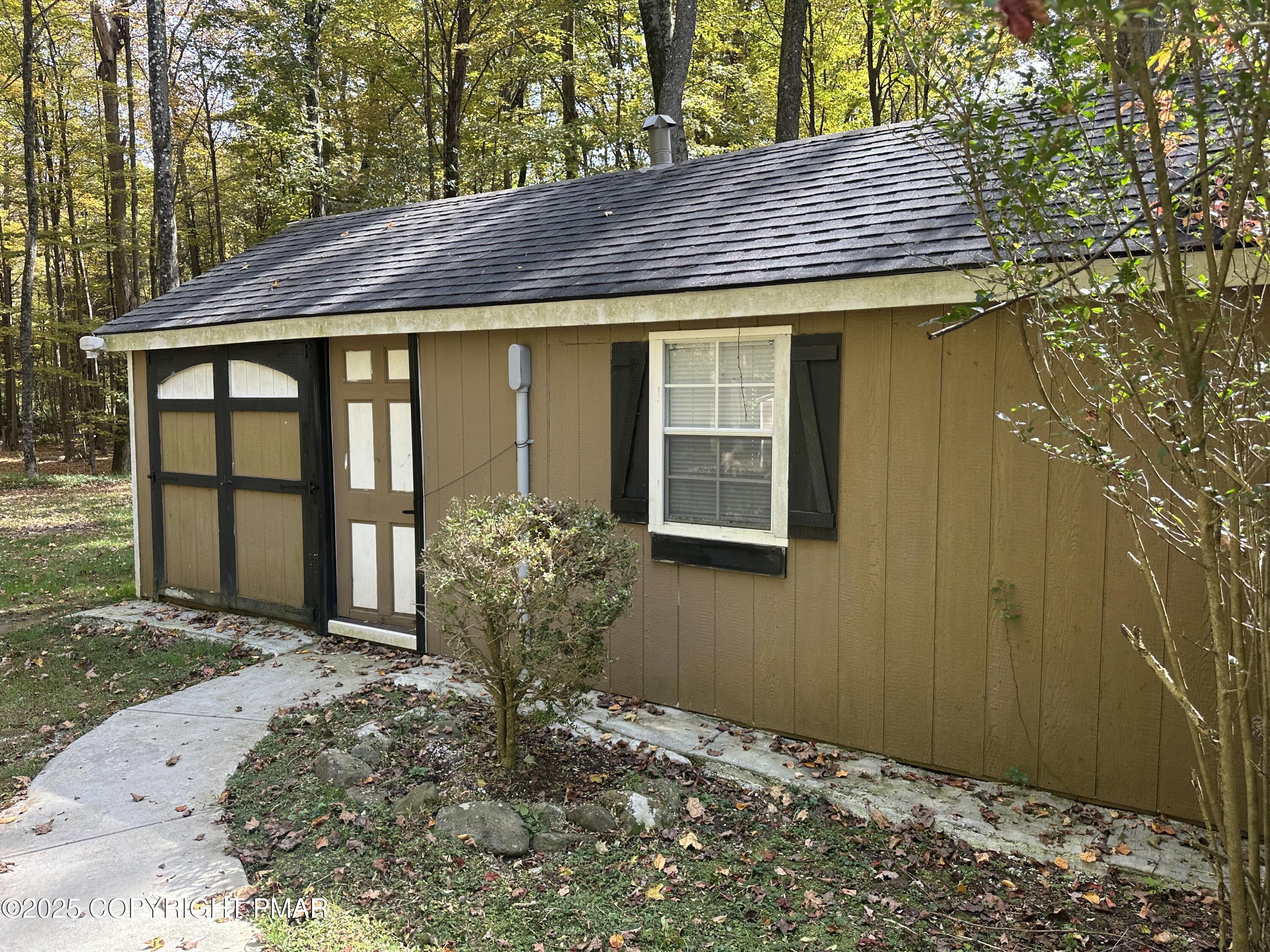 1885 Sullivan Trail Tannersville, PA 18372 - Photo 33 of 46 a view of house with backyard and outdoor seating