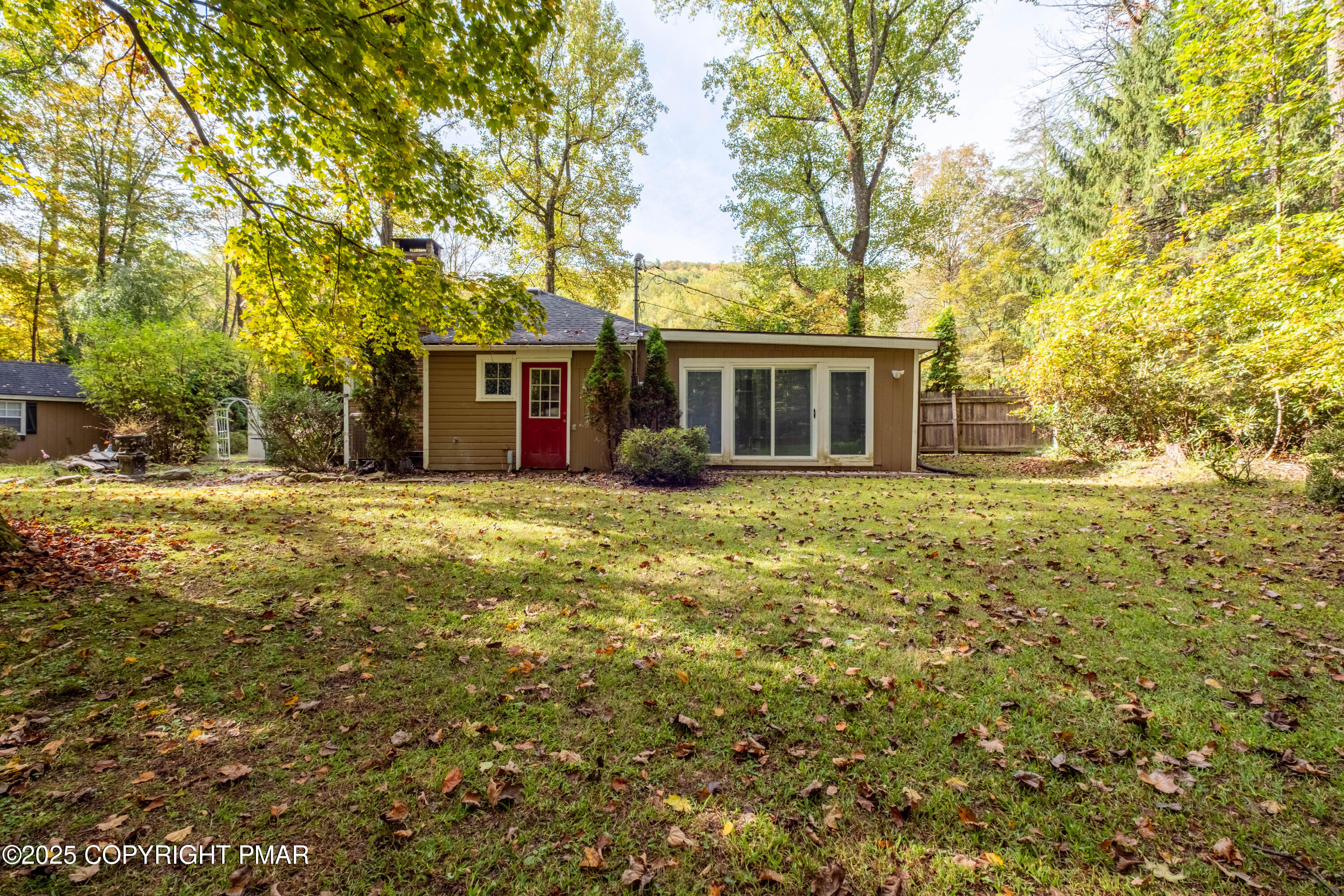 1885 Sullivan Trail Tannersville, PA 18372 - Photo 38 of 46 a front view of house with yard and trees around