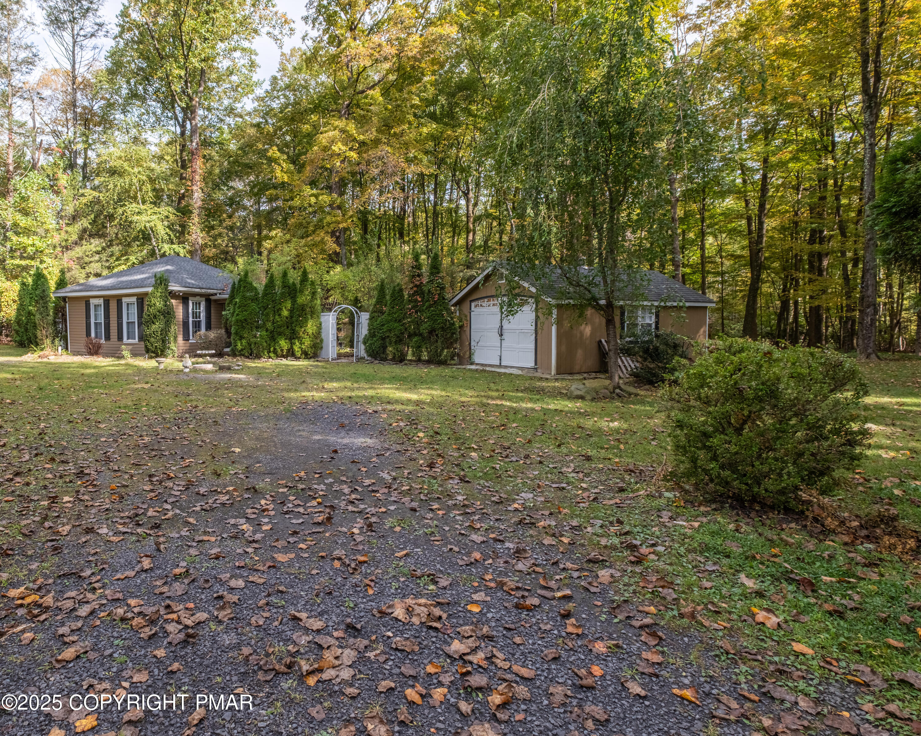 1885 Sullivan Trail Tannersville, PA 18372 - Photo 6 of 46 front view of a house with a yard