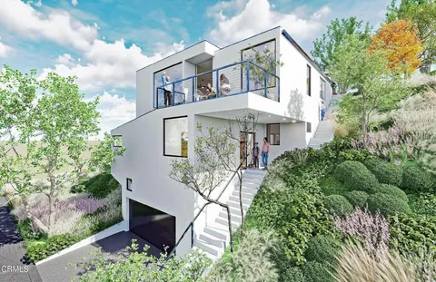 a outdoor living space with furniture and a potted plant