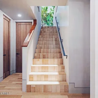 a very nice looking living room with a large window