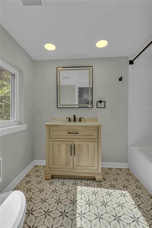 1225 Lovi Road Freedom, PA 15042 - Photo 16 of 41 a bathroom with a sink vanity and mirror
