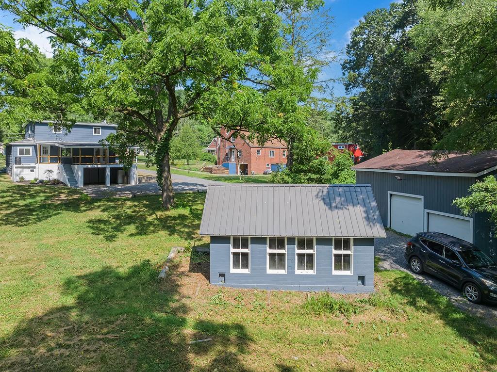 1225 Lovi Road Freedom, PA 15042 - Photo 17 of 41 an aerial view of a house with a yard table and chairs