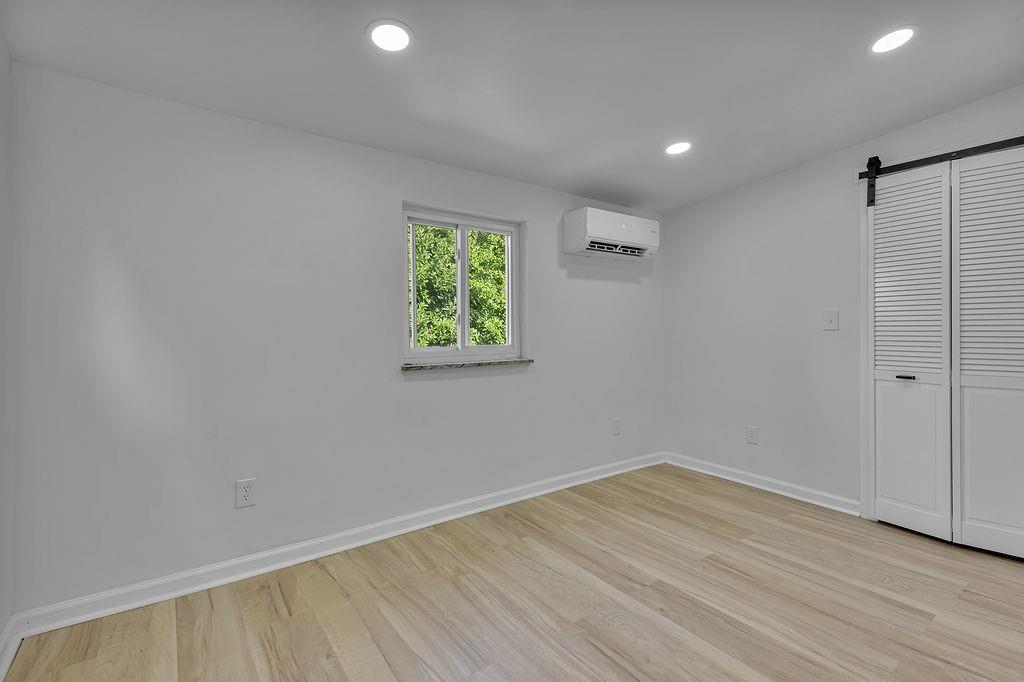 1225 Lovi Road Freedom, PA 15042 - Photo 24 of 41 a view of room with wooden floor and window