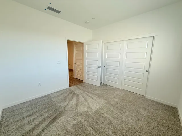 an empty room with closet