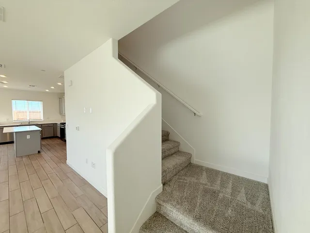 a view of a living room with windows