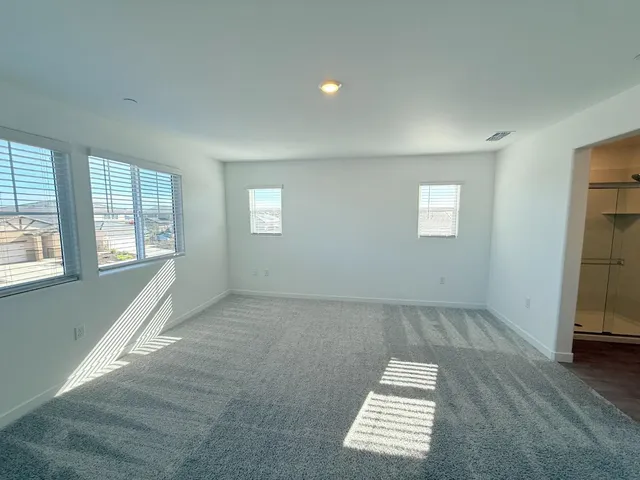 an empty room with windows