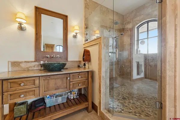 a kitchen with stainless steel appliances a sink and a large window
