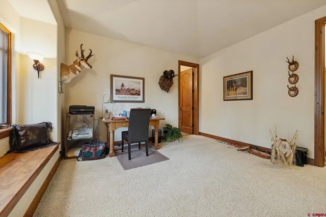 a view of a workspace with a couch