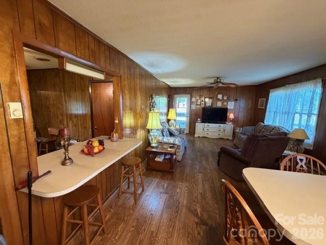 20415 Efird Road Albemarle, NC 28001 - Photo 6 of 16 a large living room with furniture and wooden floor