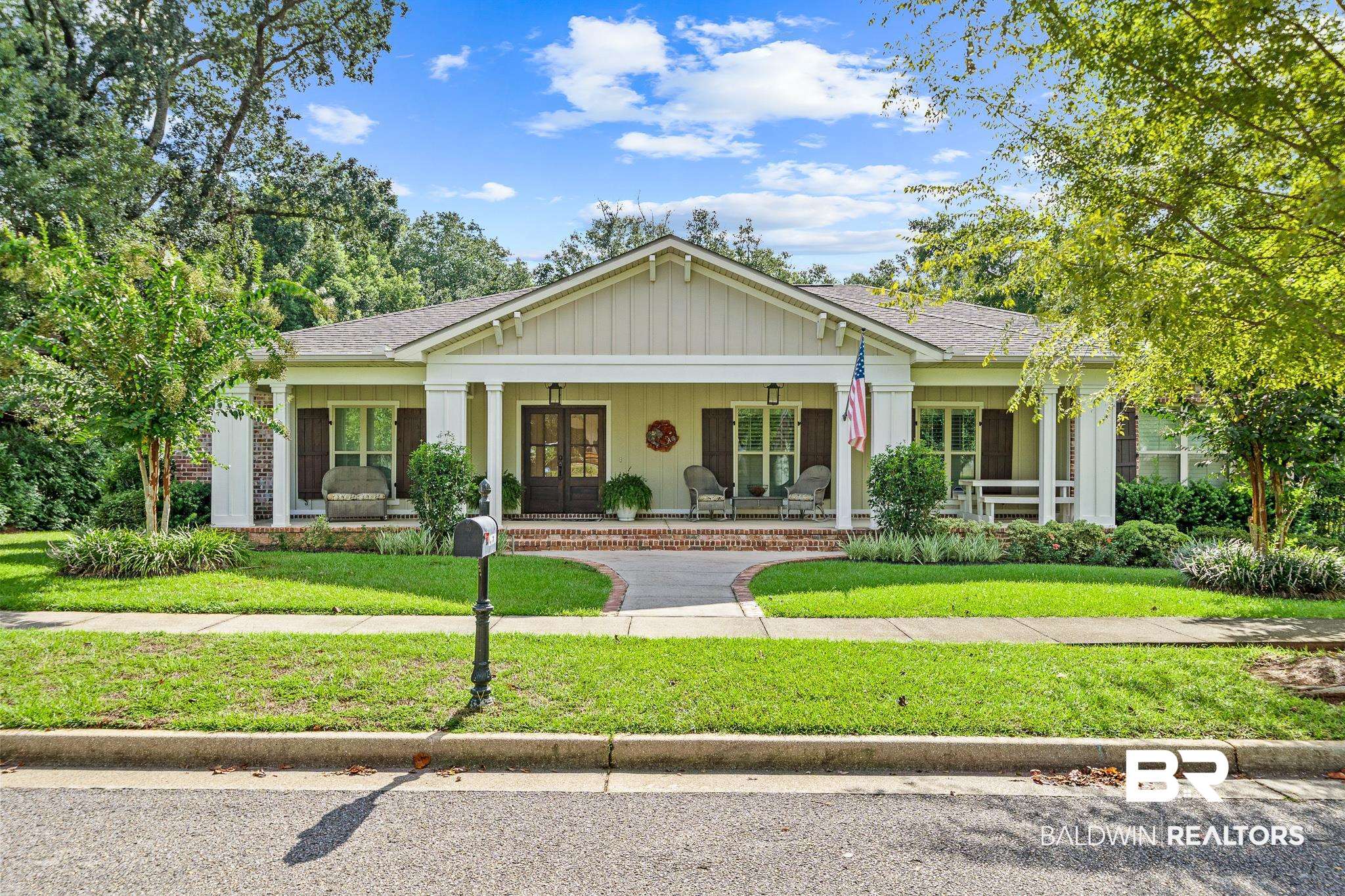 29530 St John Street Daphne, AL 36526 - Photo 32 of 38 View of front of home with a front yard and a porch