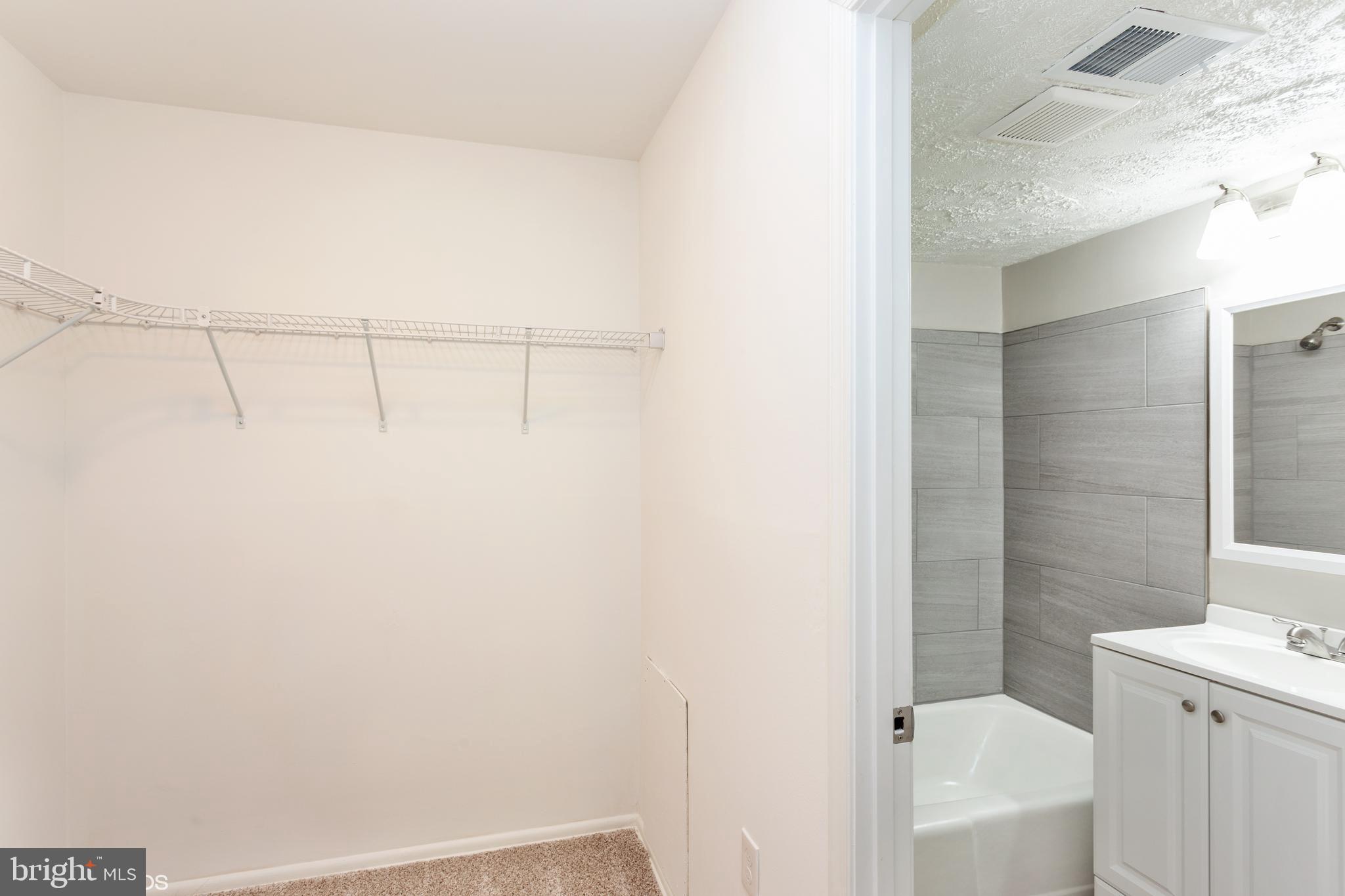 3813 Swann Road, Unit 1 Suitland, MD 20746 - Photo 15 of 20 master bedroom walk-in closet