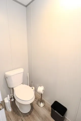 a bathroom with a sink toilet tub and shower