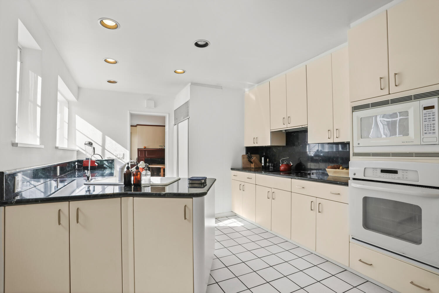11 Searles Road Darien, CT 06820 - Photo 12 of 43 a kitchen with stainless steel appliances granite countertop a sink and cabinets