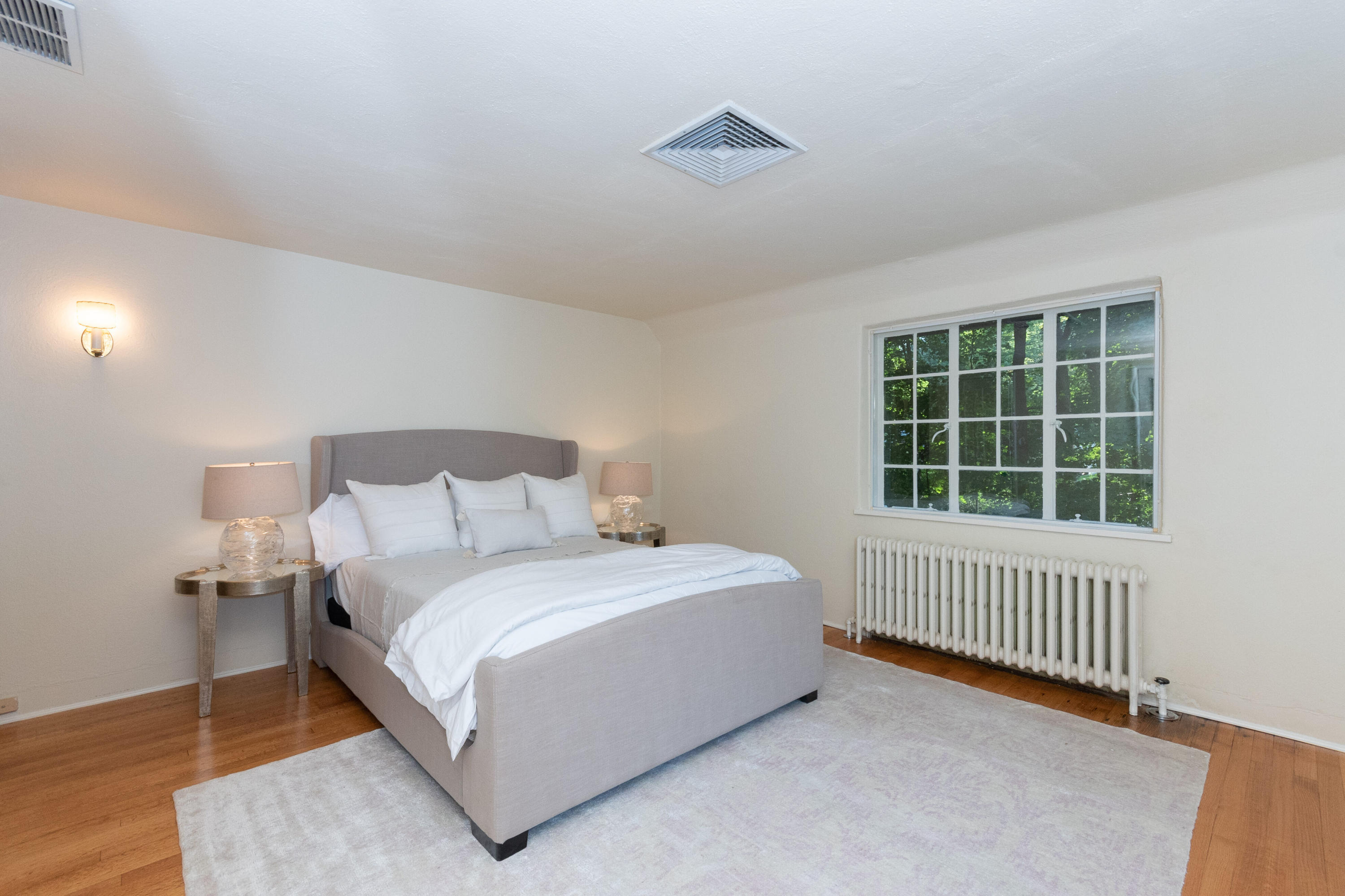 11 Searles Road Darien, CT 06820 - Photo 22 of 43 a bedroom with a bed and a window