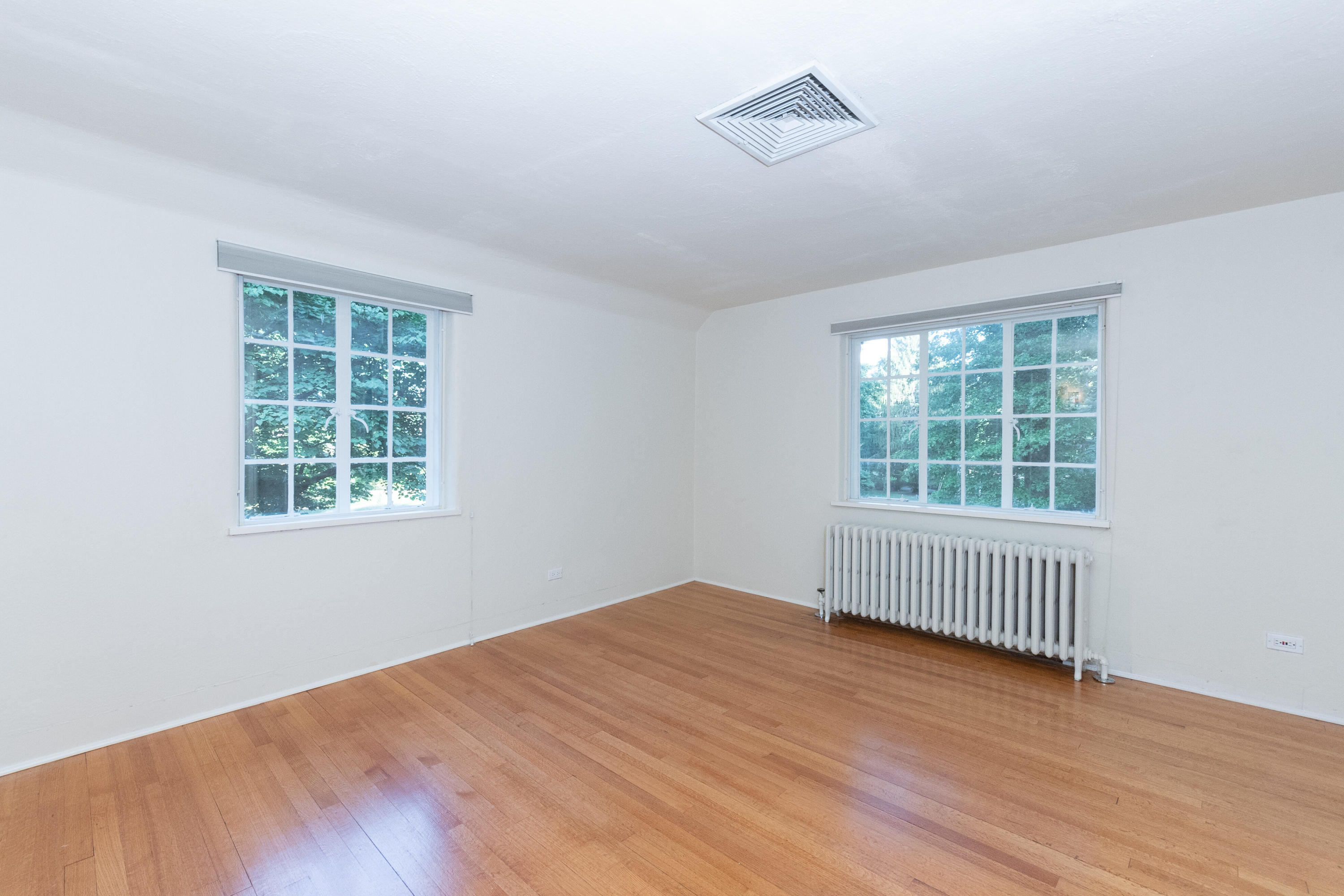11 Searles Road Darien, CT 06820 - Photo 30 of 43 a view of an empty room with wooden floor and a window
