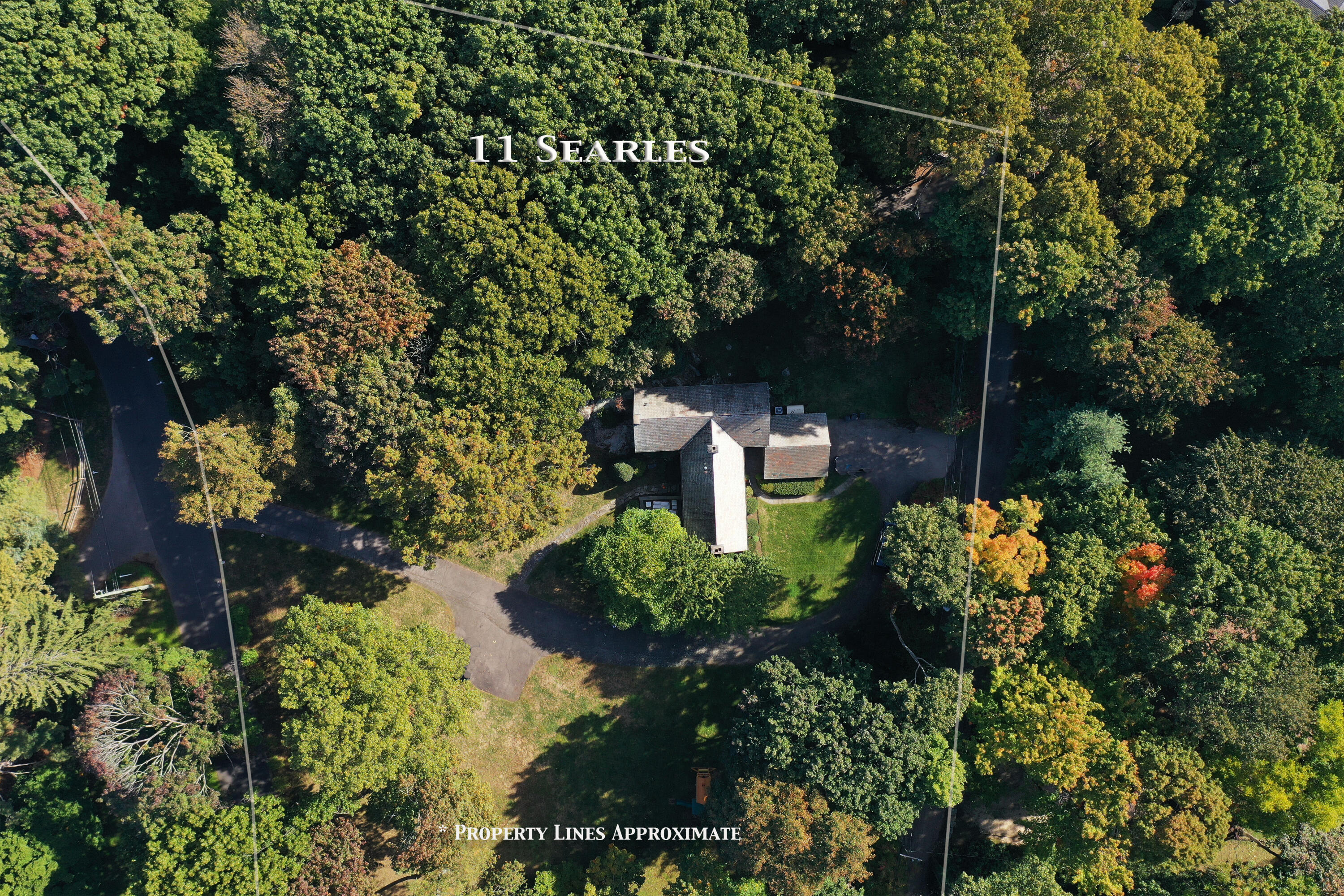 11 Searles Road Darien, CT 06820 - Photo 38 of 43 an aerial view of a house with a yard