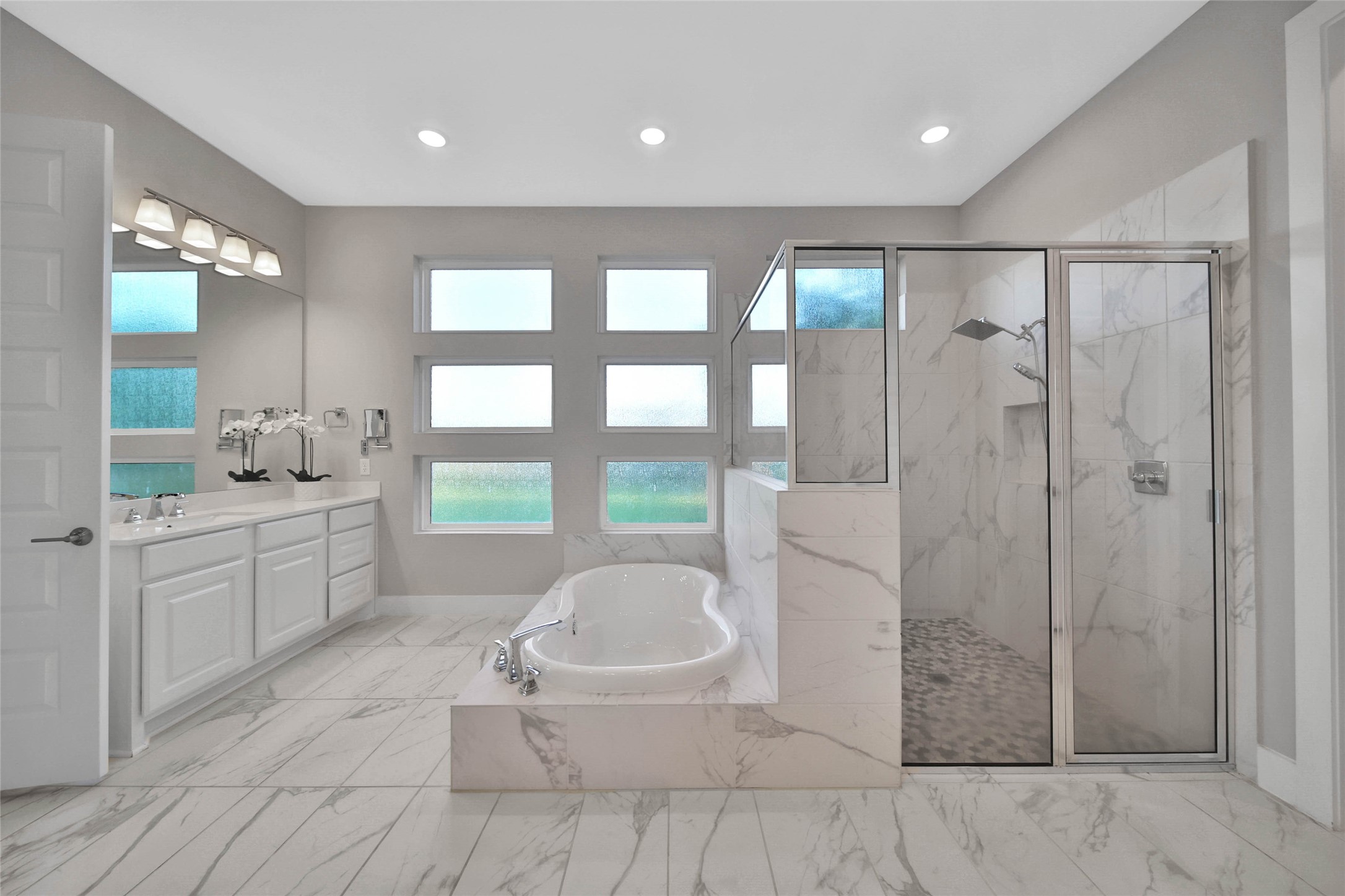 29402 Cir S Rnch Trail Fulshear, TX 77406 - Photo 28 of 50 Dual vanities and a functional layout offer plenty of room for two to get ready each day. The thoughtful design adds both convenience and comfort to the space.