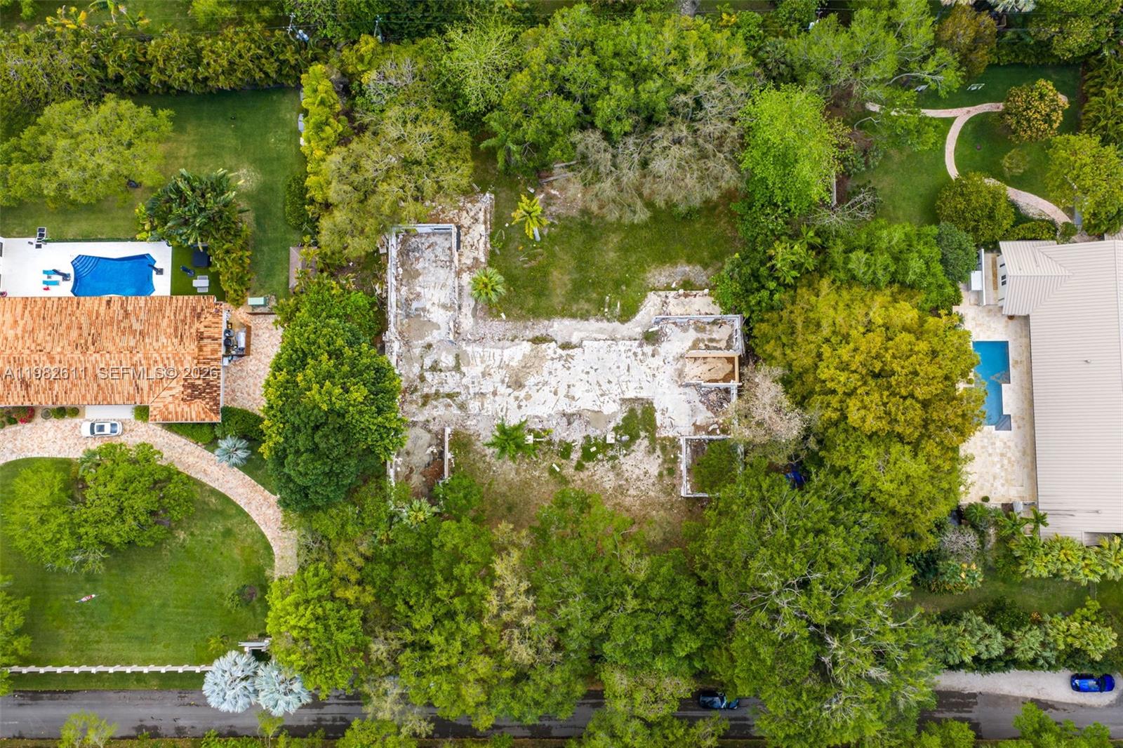 10550 Old Cutler Road Coral Gables, FL 33156 - Photo 2 of 24 an aerial view of residential house with outdoor space