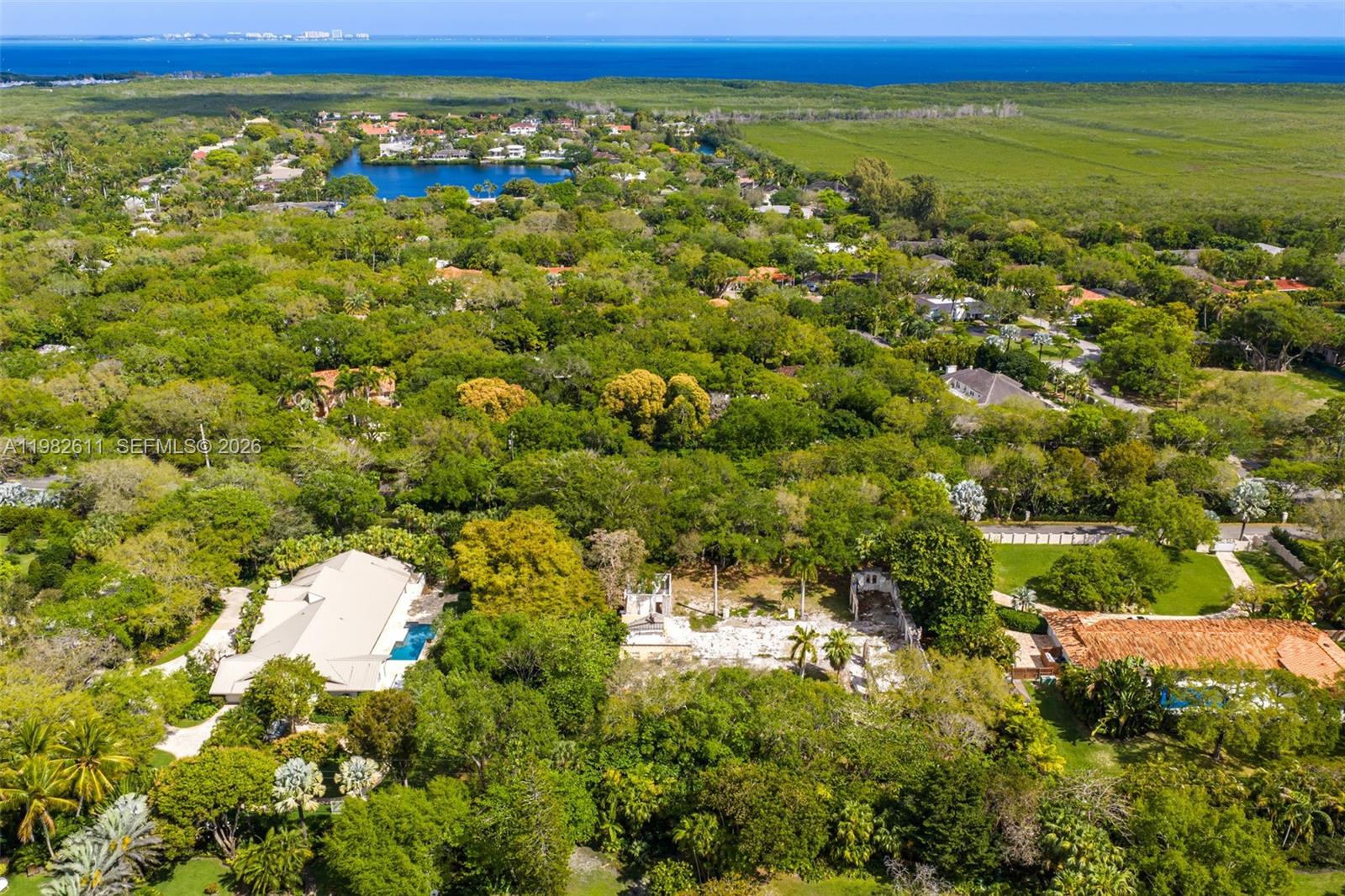 10550 Old Cutler Road Coral Gables, FL 33156 - Photo 24 of 24 a view of a field with an outdoor space