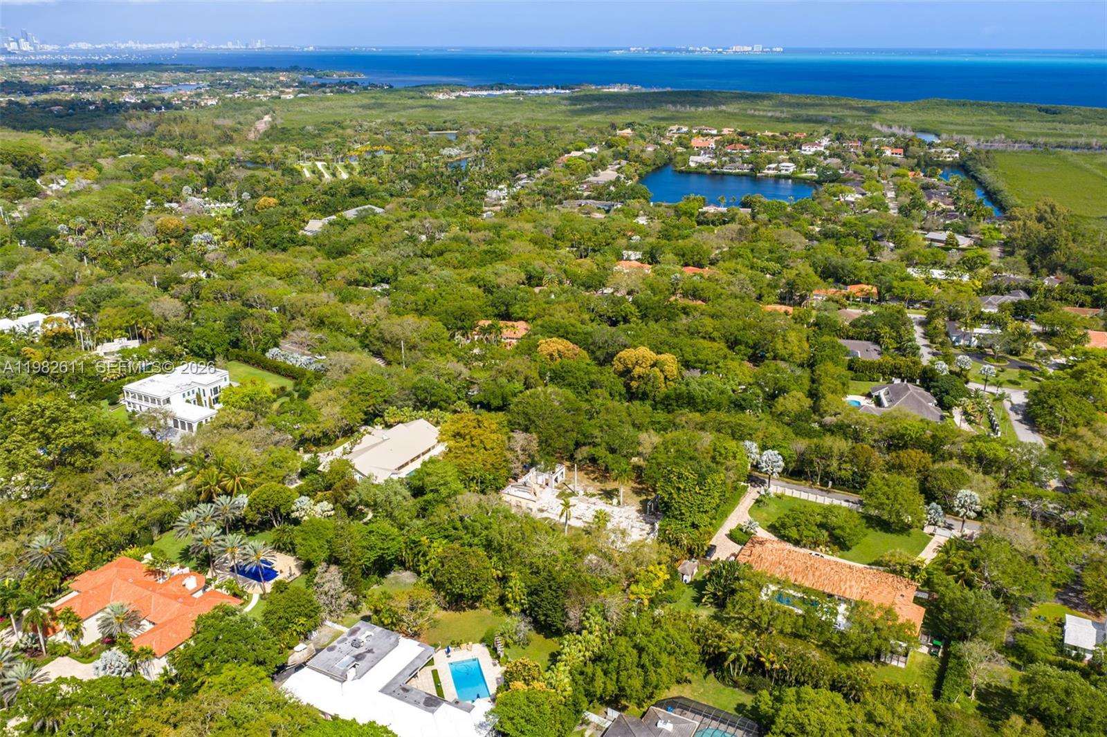 10550 Old Cutler Road Coral Gables, FL 33156 - Photo 9 of 24 a view of a large body of water with a building