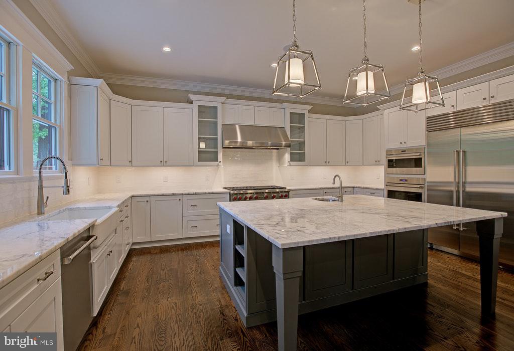 1922 Byrd Road Vienna, VA 22182 - Photo 25 of 48 Kitchen island with Quartz countertops