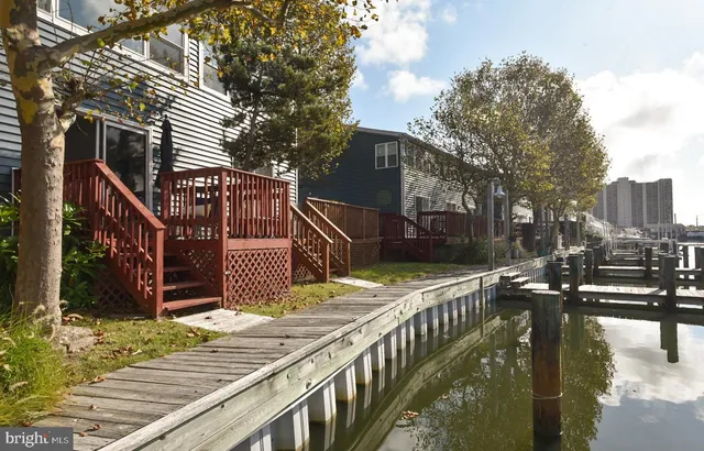 a front view of a house with stairs