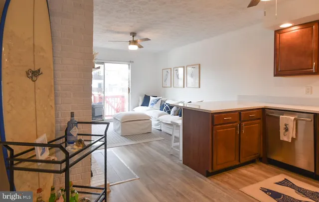 a bathroom with a toilet a sink and a shower