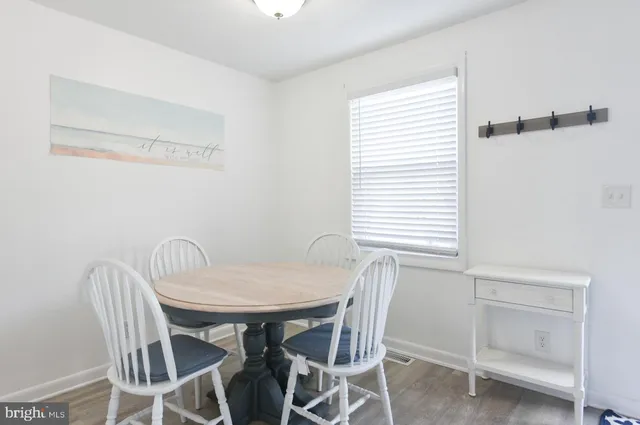 a view of entryway with wooden floor