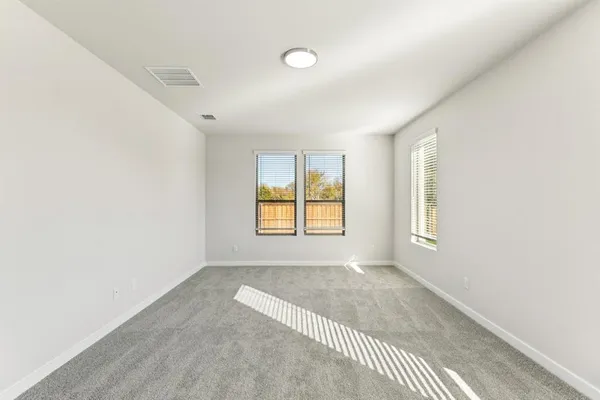a view of a room with windows