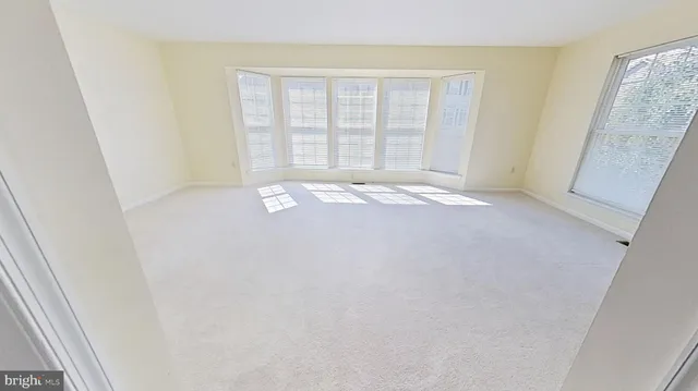 a kitchen with stainless steel appliances a refrigerator sink and cabinets