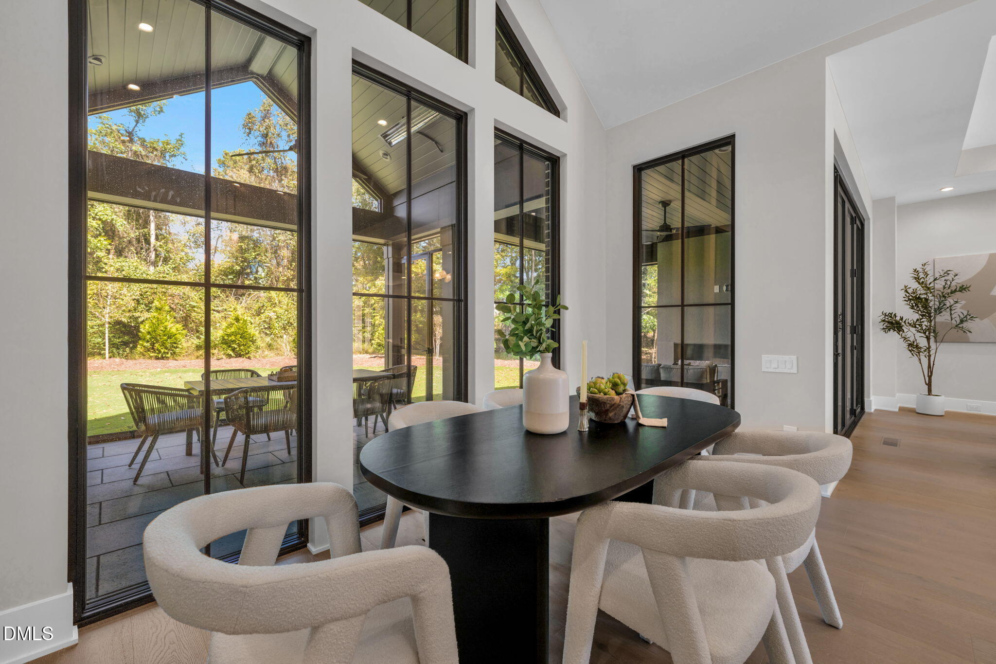 504 Colvard Woods Way Durham, NC 27713 - Photo 23 of 77 a kitchen with a table chairs and couches
