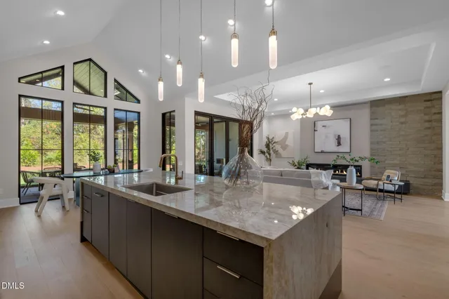 a bathroom with a sink and mirror