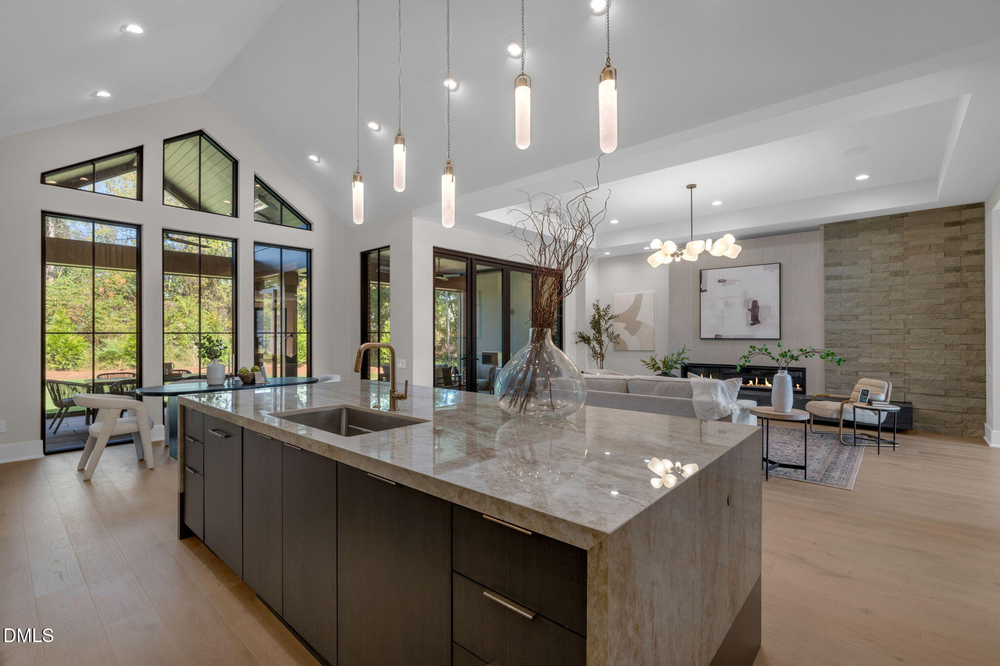 504 Colvard Woods Way Durham, NC 27713 - Photo 28 of 77 a large kitchen with kitchen island a large island in it