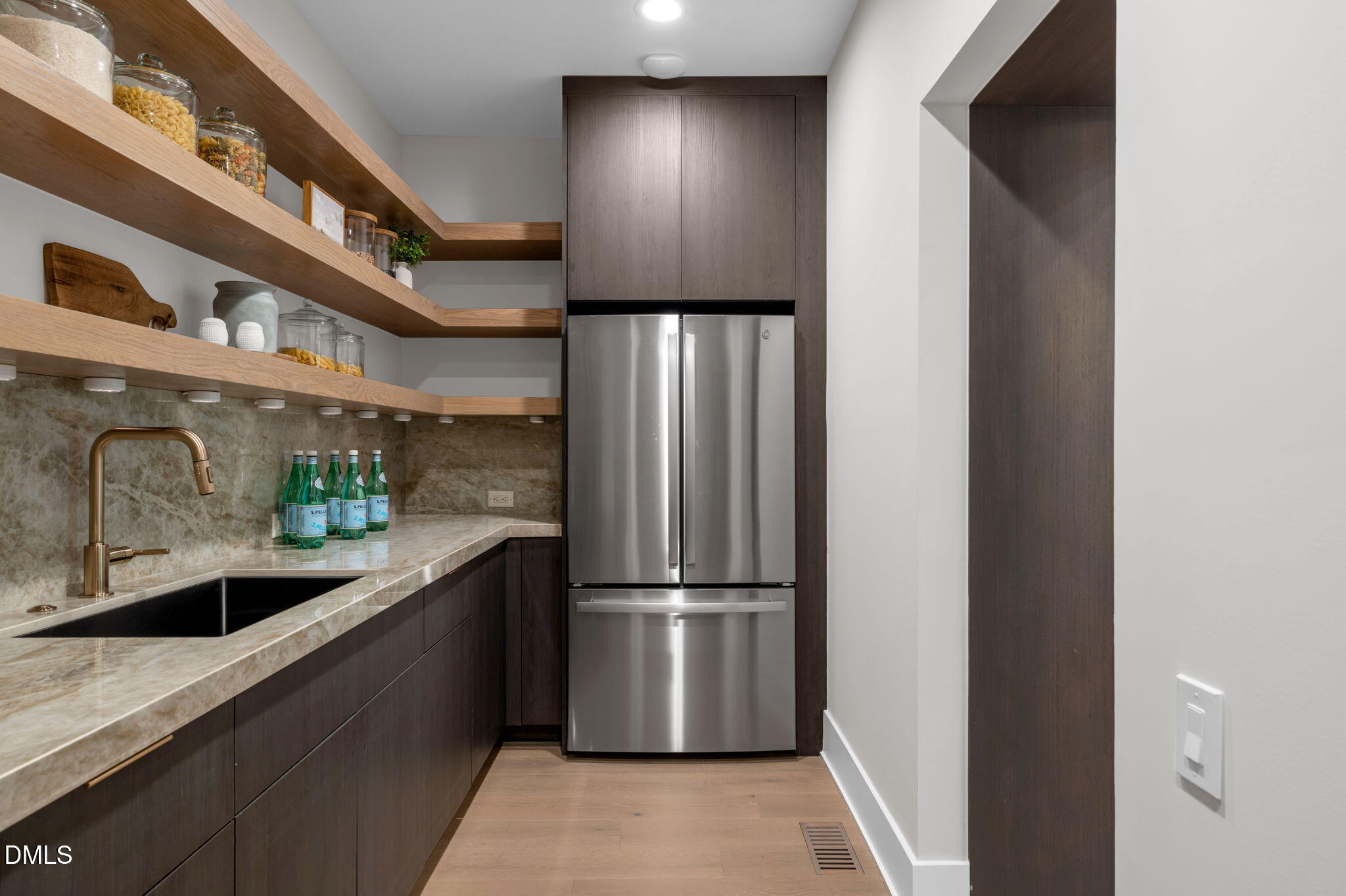 504 Colvard Woods Way Durham, NC 27713 - Photo 30 of 77 a kitchen with stainless steel appliances granite countertop a refrigerator a stove and a sink