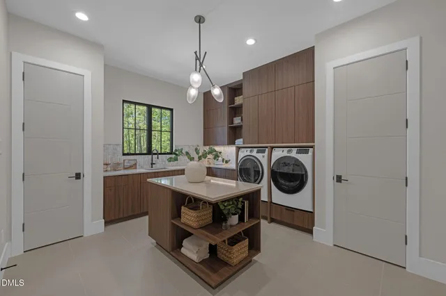 a large bathroom with a double vanity sink toilet and shower