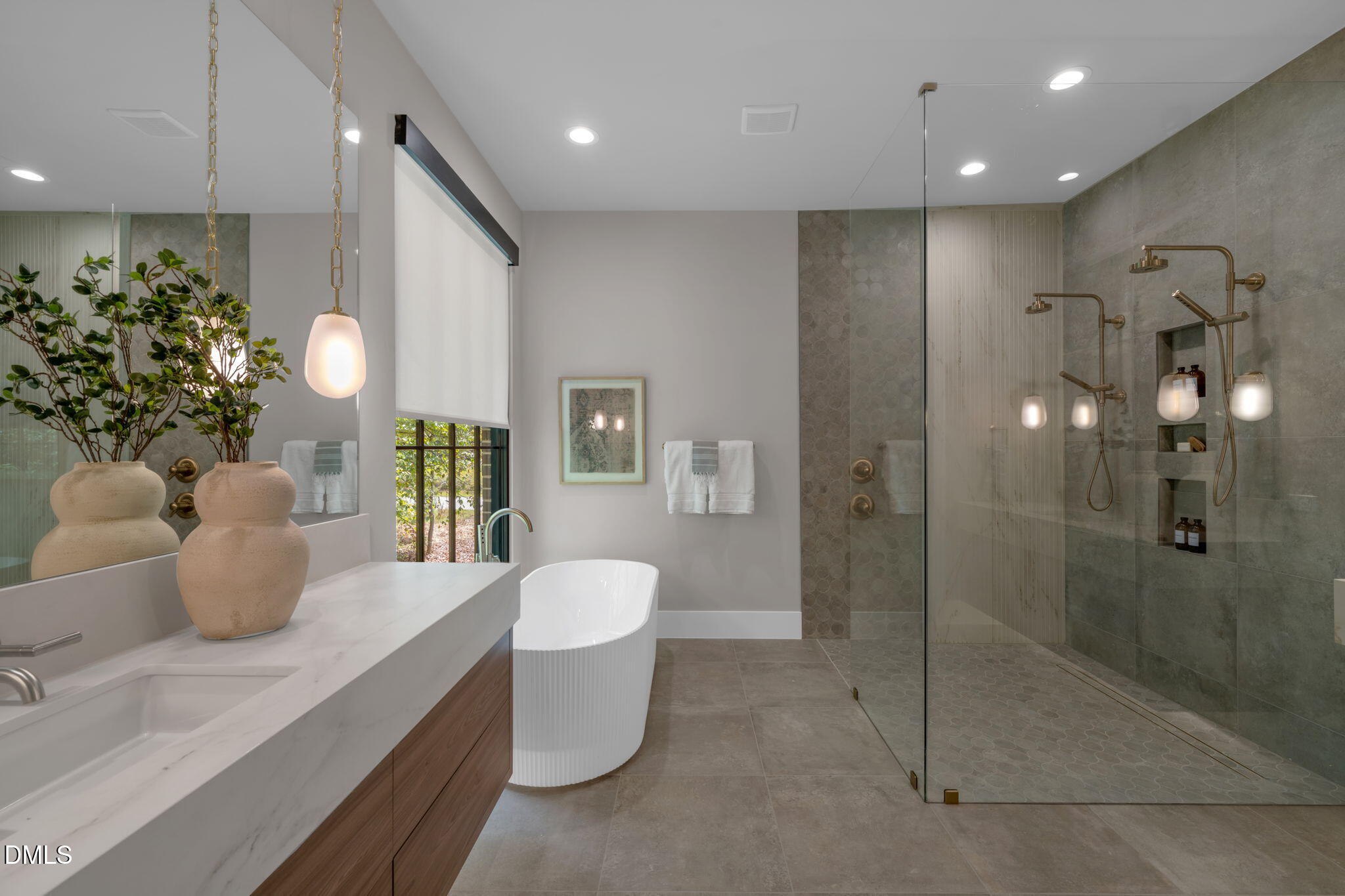 504 Colvard Woods Way Durham, NC 27713 - Photo 40 of 77 a large bathroom with a double vanity sink toilet and shower