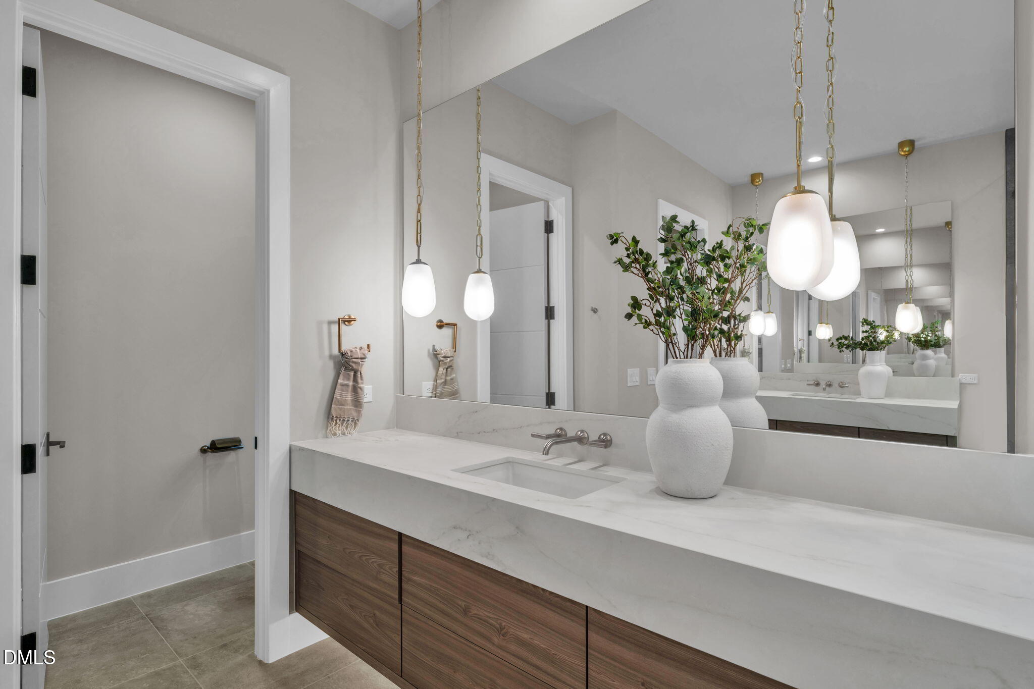 504 Colvard Woods Way Durham, NC 27713 - Photo 41 of 77 a bathroom with a sink and a mirror