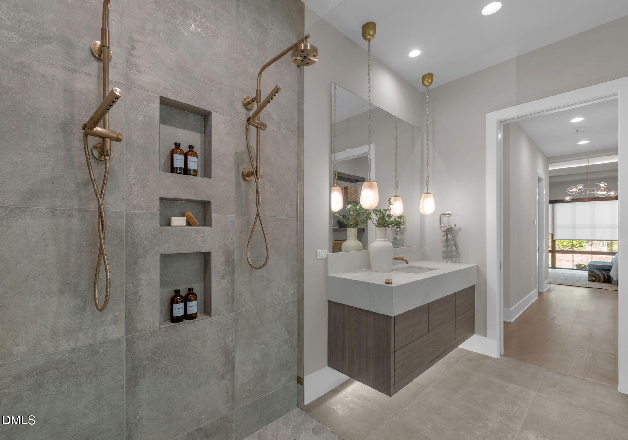 504 Colvard Woods Way Durham, NC 27713 - Photo 43 of 77 a bathroom with a sink mirror and shower