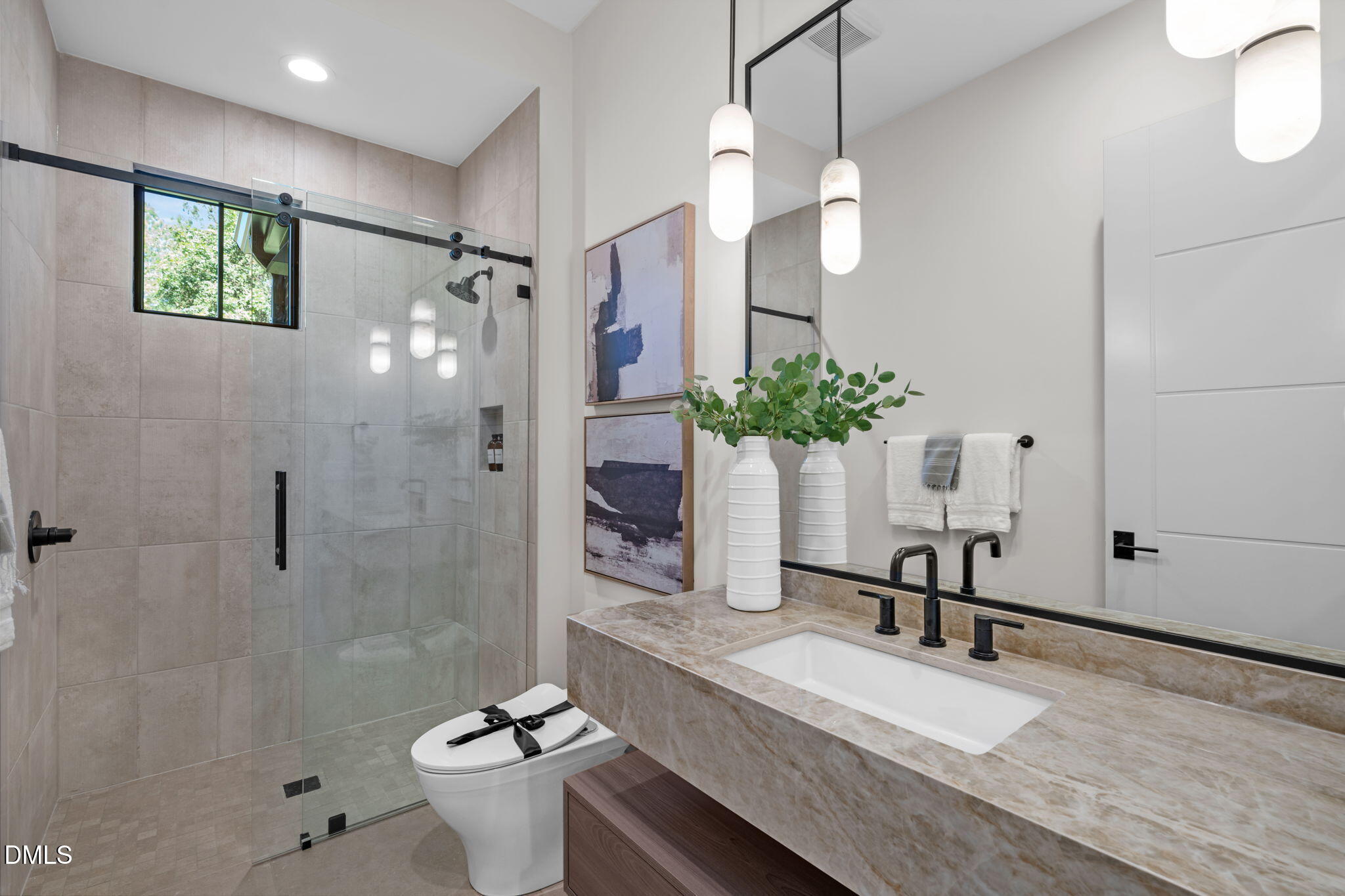 504 Colvard Woods Way Durham, NC 27713 - Photo 49 of 77 a bathroom with a sink and mirror