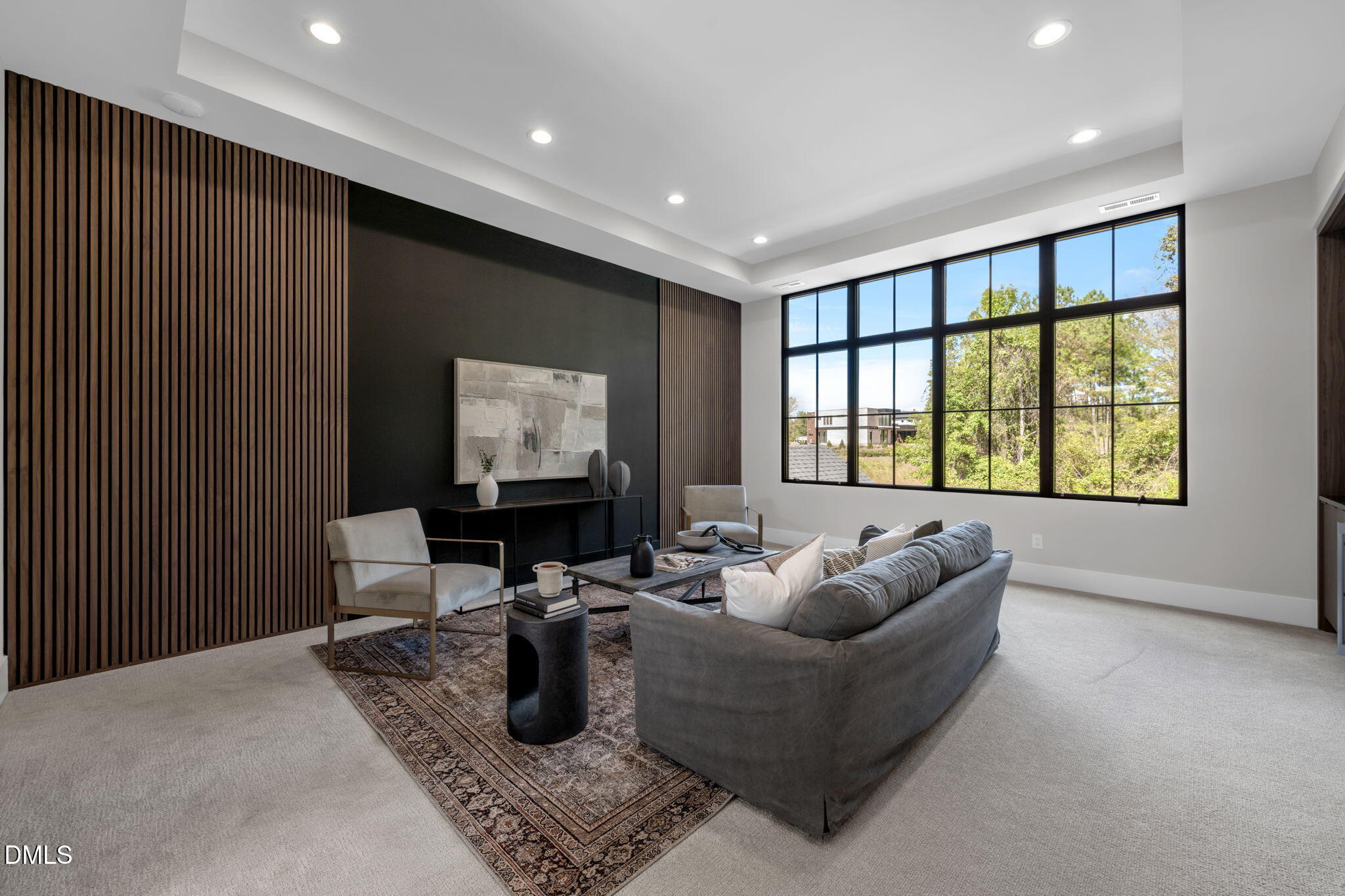504 Colvard Woods Way Durham, NC 27713 - Photo 51 of 77 a living room with furniture and a flat screen tv