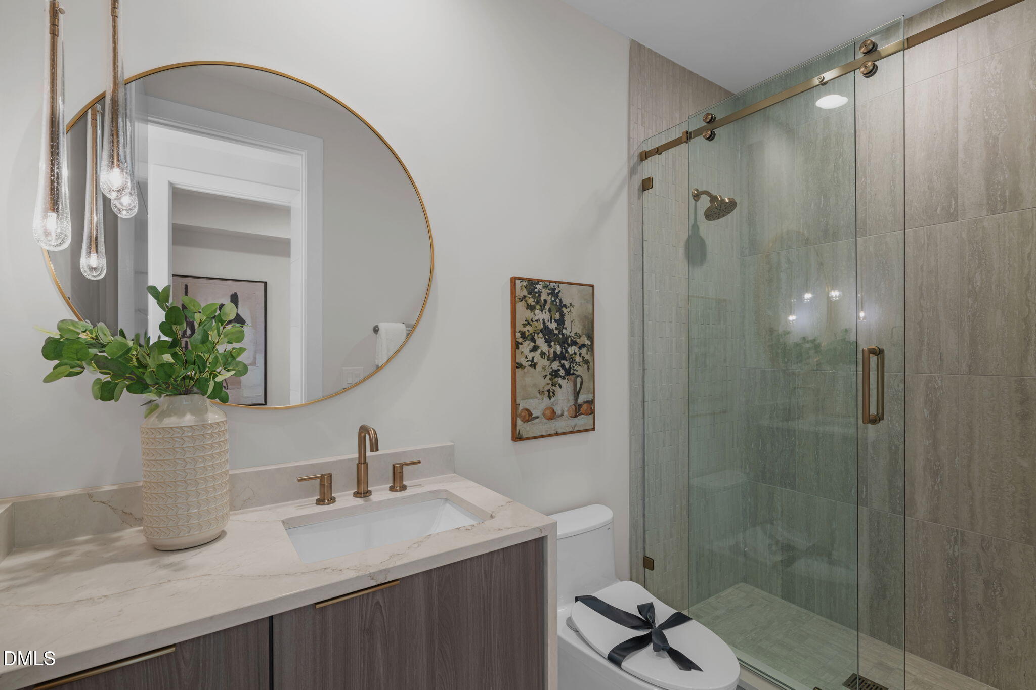 504 Colvard Woods Way Durham, NC 27713 - Photo 62 of 77 a bathroom with a granite countertop sink a shower and a mirror