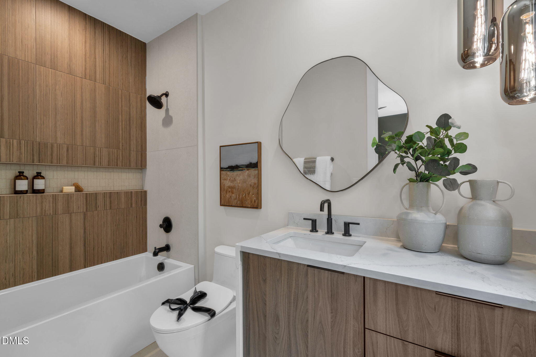 504 Colvard Woods Way Durham, NC 27713 - Photo 66 of 77 a bathroom with a tub sink and mirror