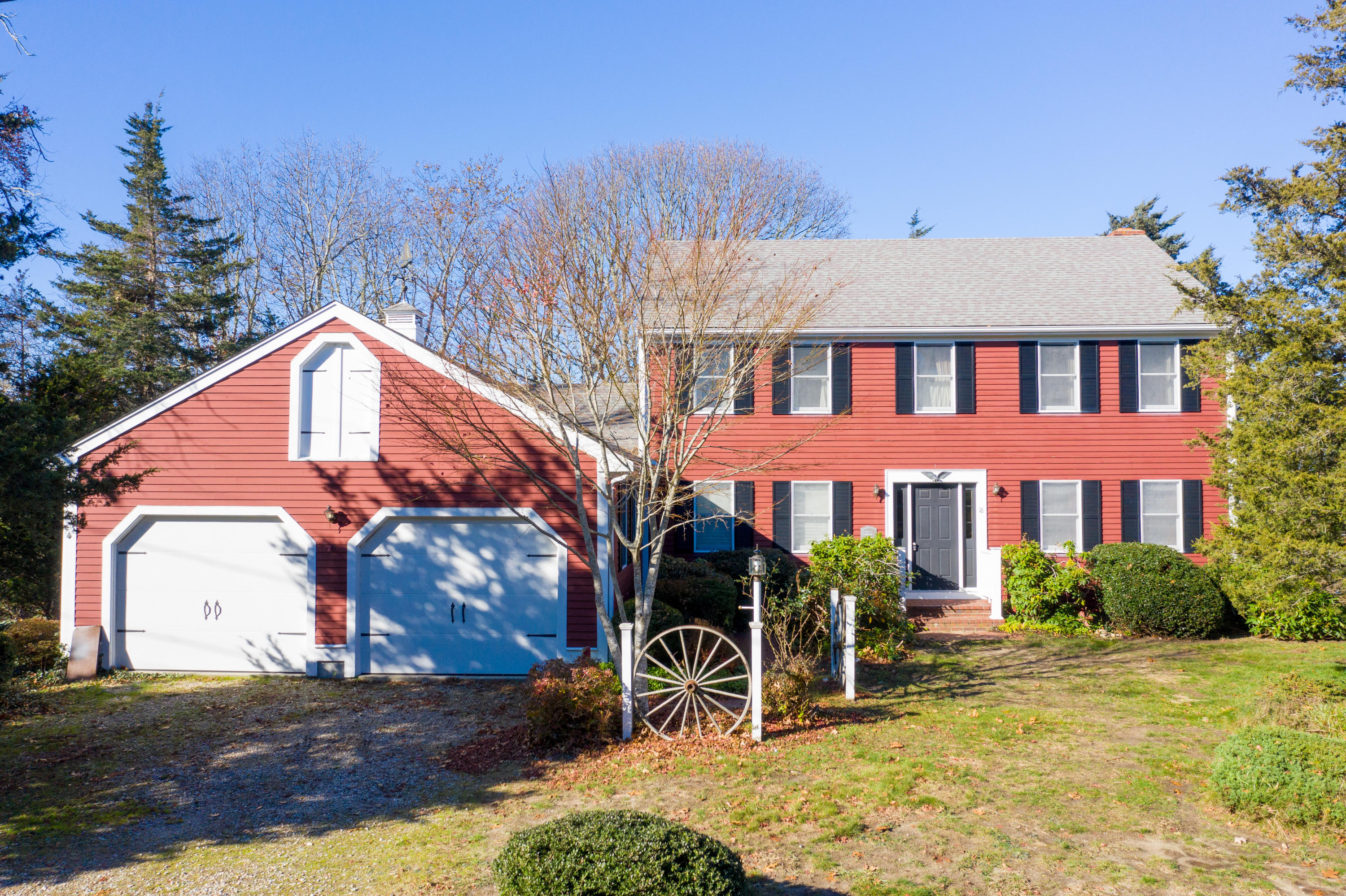 18 Warren Road Bourne, MA 02532 - Photo 1 of 36 a front view of a house with garden