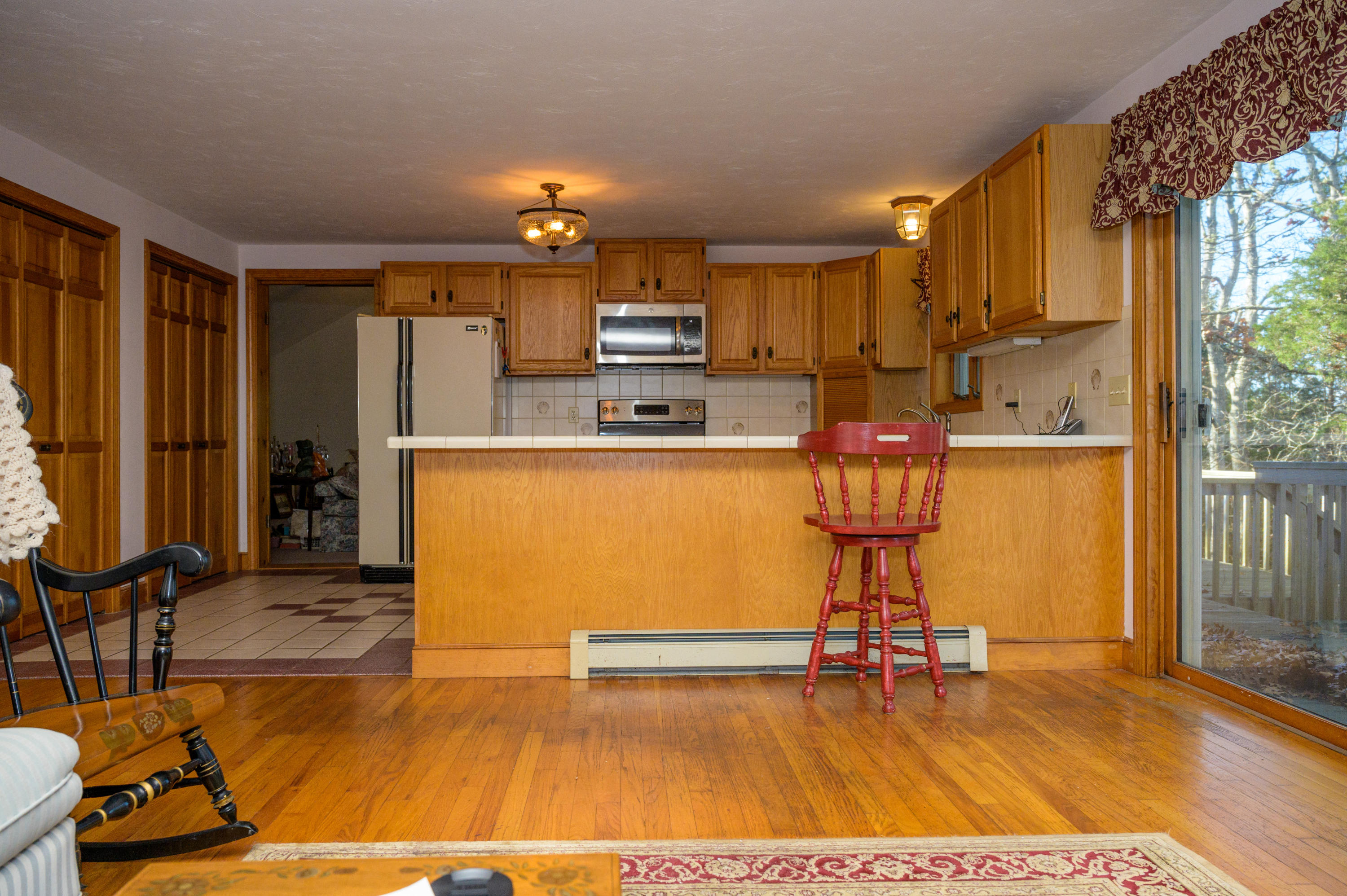 18 Warren Road Bourne, MA 02532 - Photo 12 of 36 a view of kitchen with furniture and wooden floor